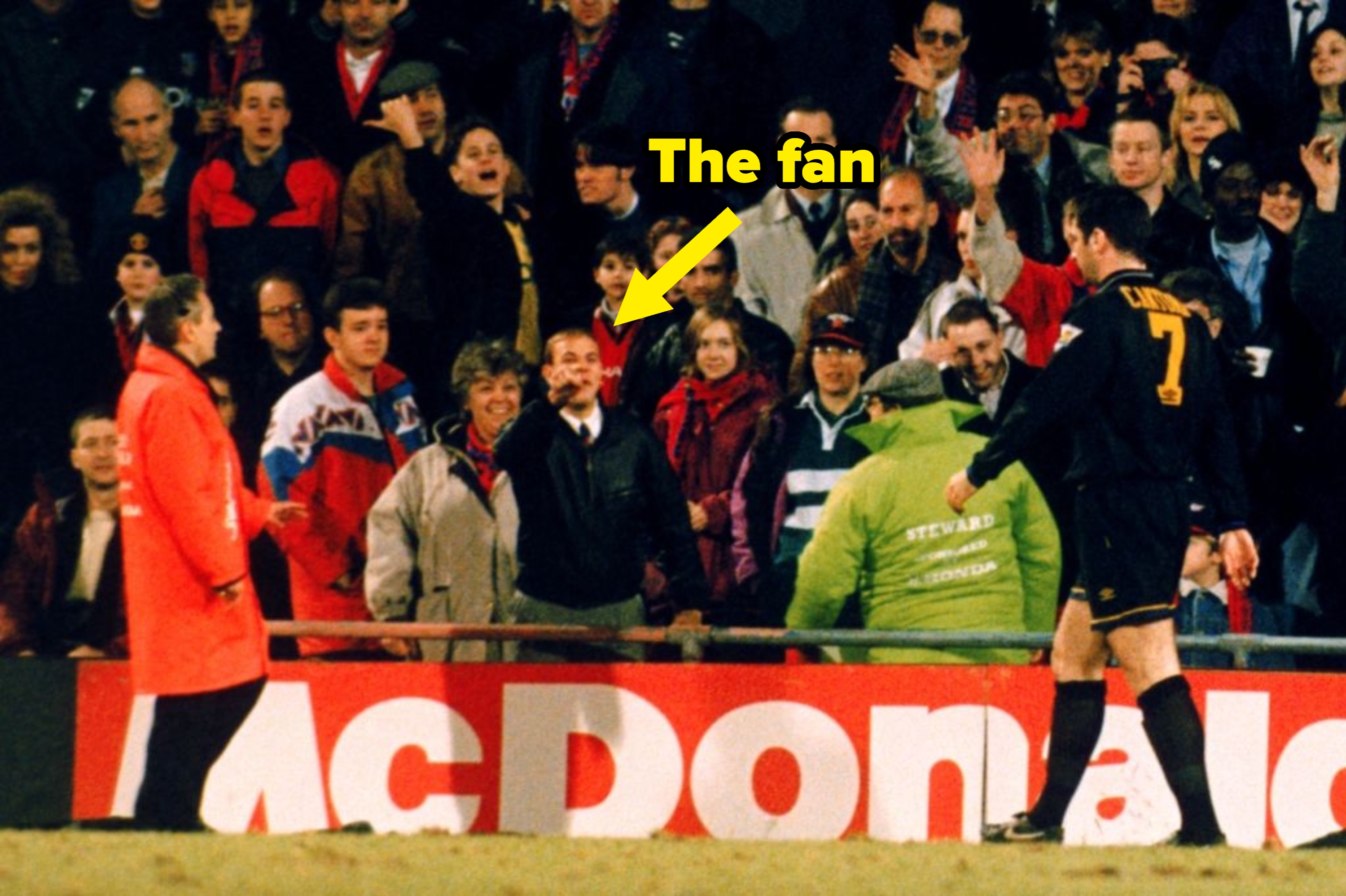 Sports assemblage  reacts arsenic  a shot    subordinate    successful  a achromatic  kit with fig   7 walks adjacent   the sidelines during a match