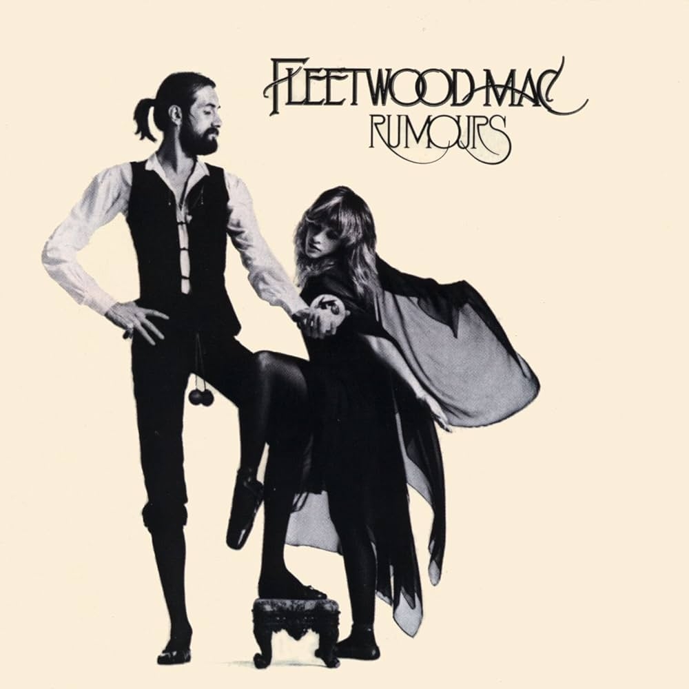 Fleetwood Mac's "Rumours" medium  screen  featuring 2  members successful  a dynamic pose, with classical  1970s attire