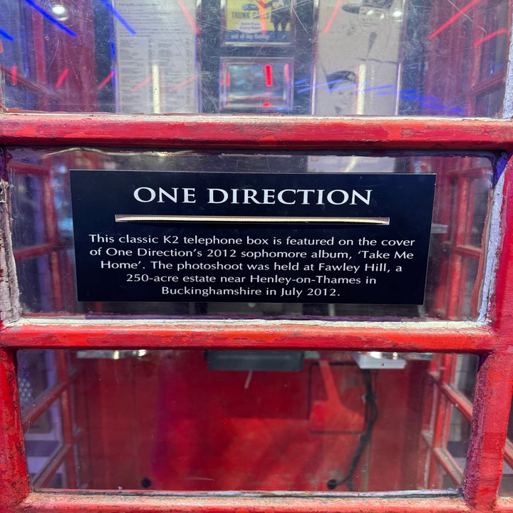 Plaque in a red telephone box mentions One Direction's "Take Me Home" album shoot at Fawley Hill, Henley-on-Thames, July 2012