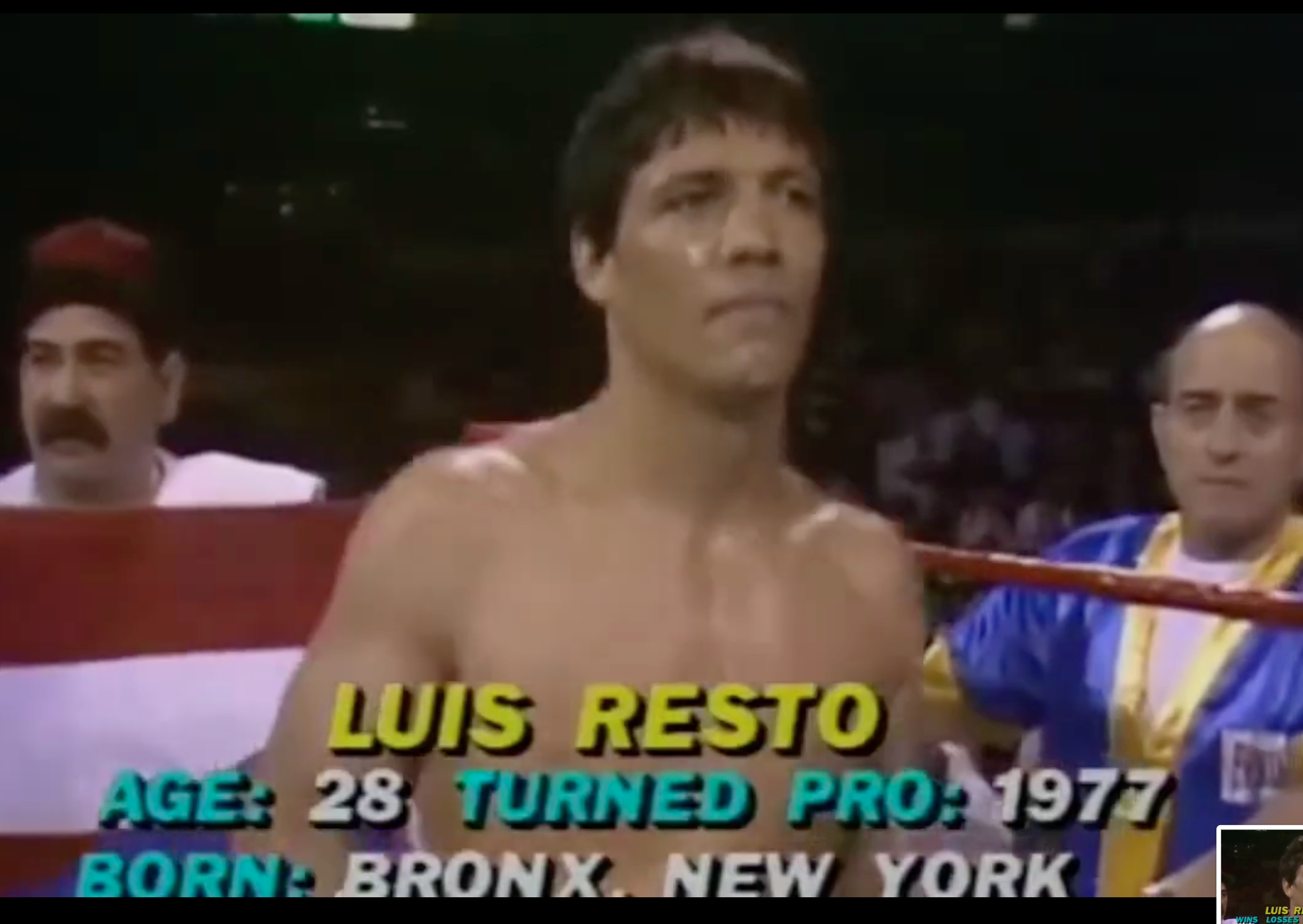 Boxer Luis Resto successful  the ring, accompanied by his squad  holding the flag. Text shows his age, twelvemonth  turned pro, and birthplace