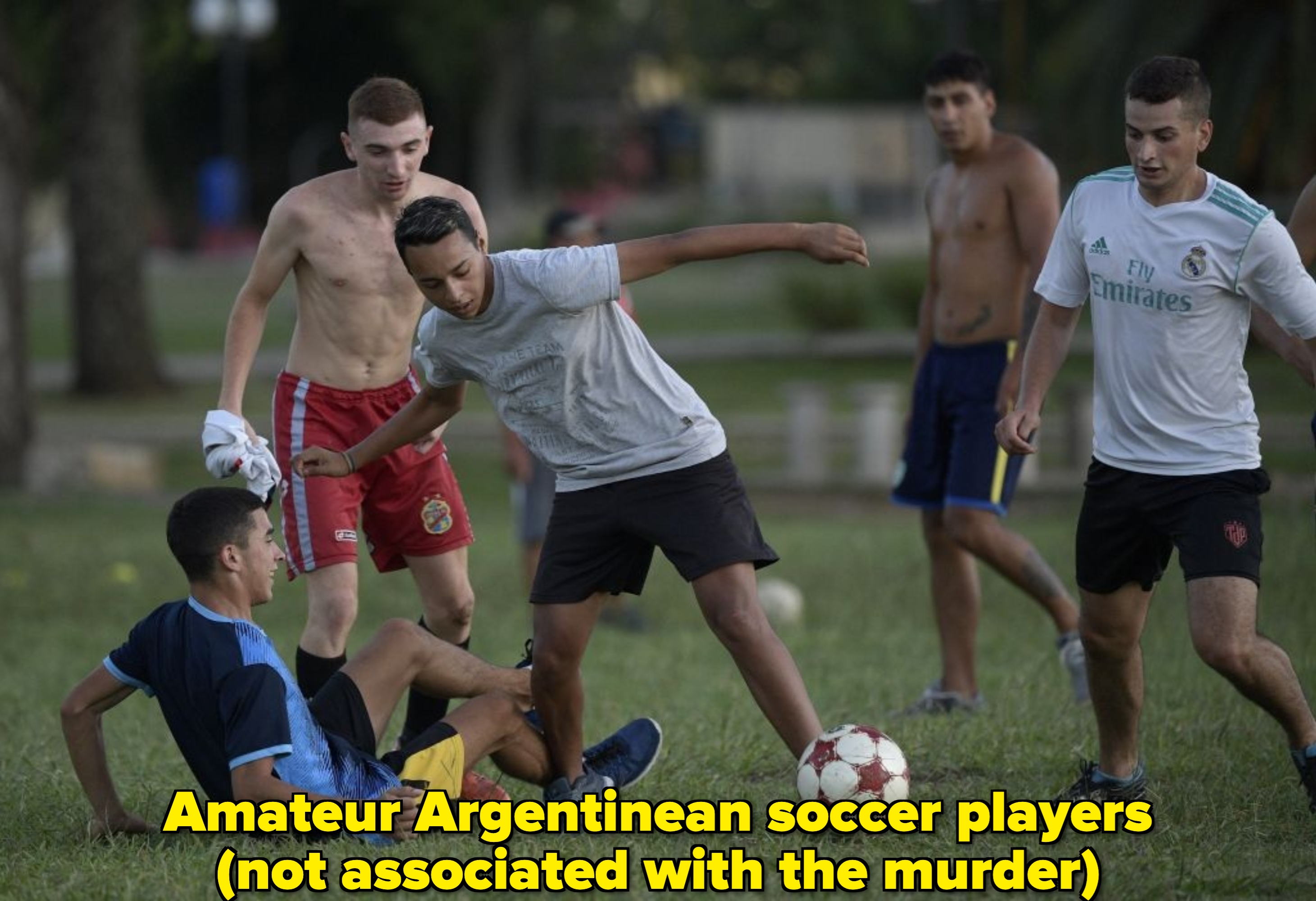 Young men play   shot    connected  a grassy field, actively engaged successful  a match, showcasing teamwork and diversion  skills