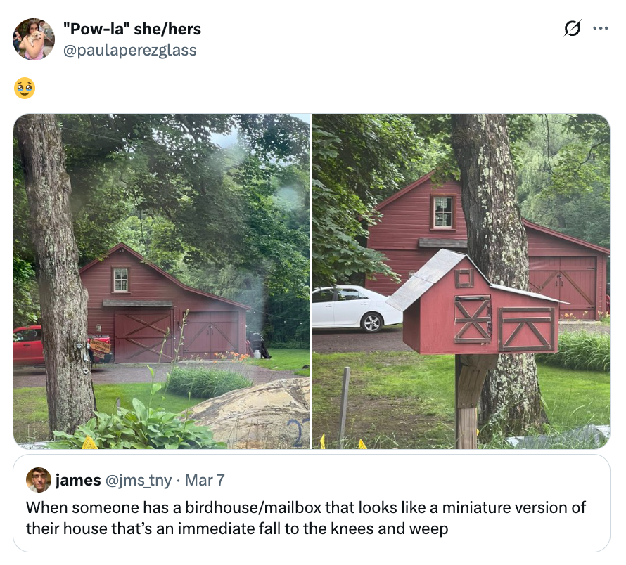 Mailbox resembling a reddish  barn successful  beforehand   of a matching house, with a tweet astir  being impressed by the design