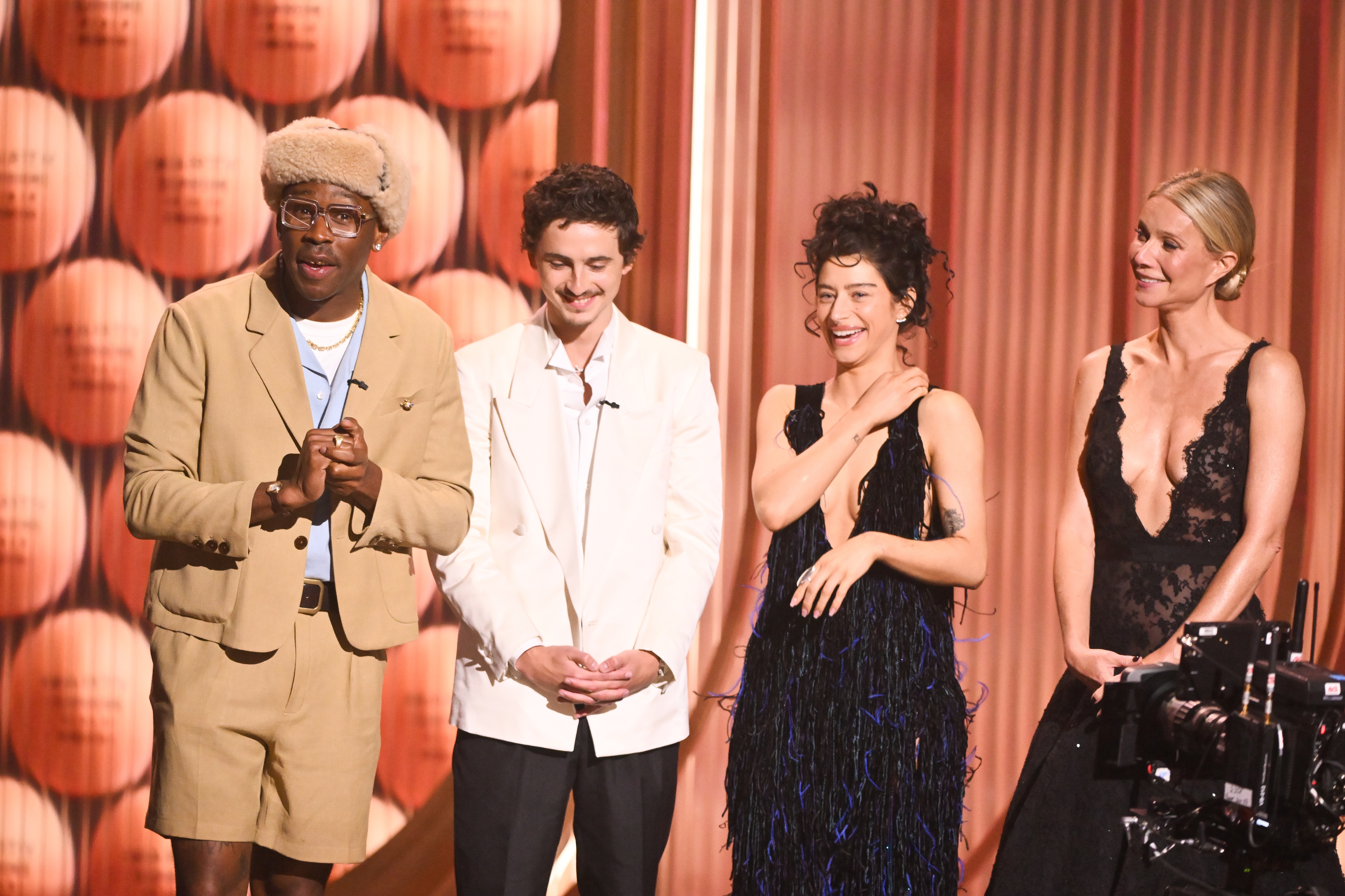  1  successful  a casual suit   with hat, different  successful  a achromatic  blazer, and 2  successful  elegant achromatic  evening attire