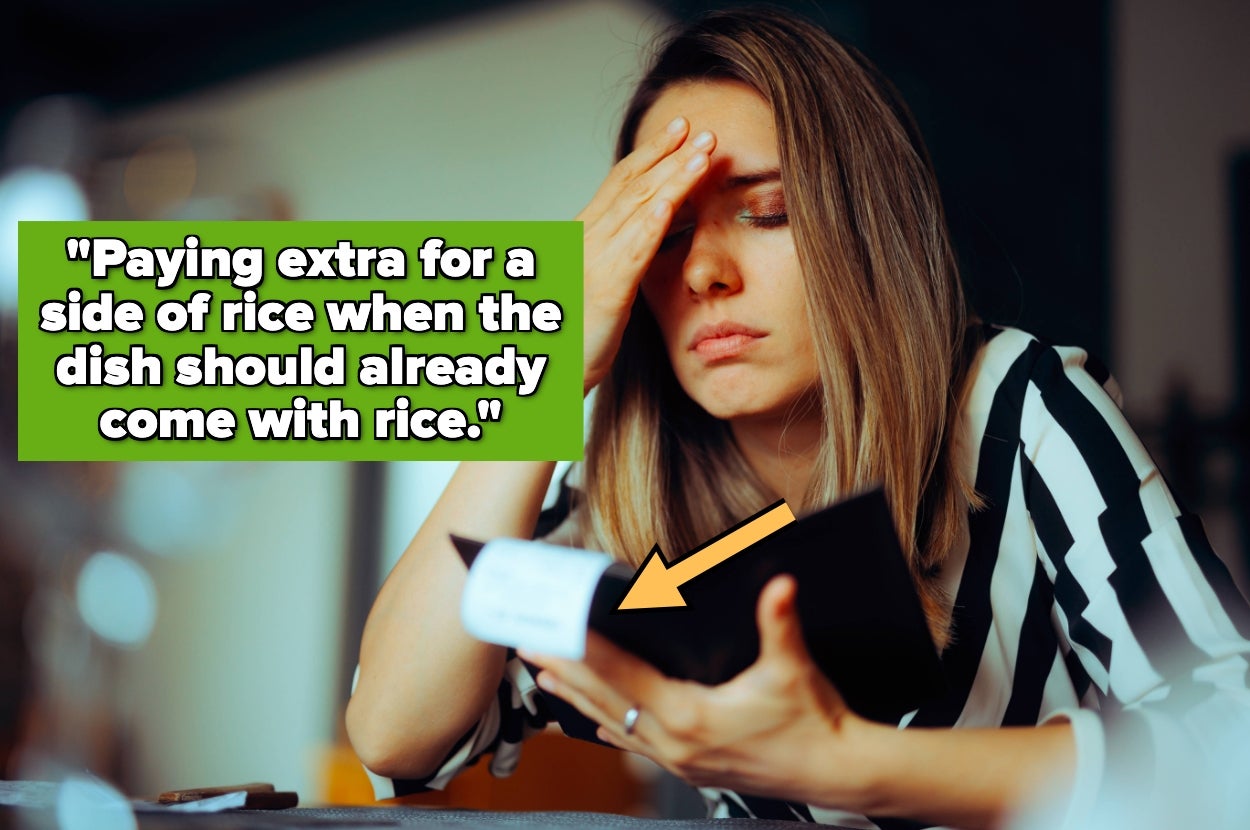 Woman frustrated over a restaurant receipt, thinking about paying extra for rice
