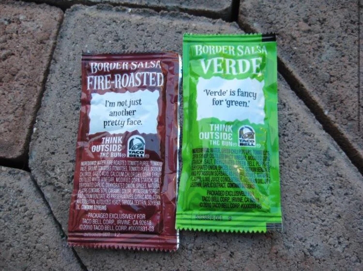  1  labeled "Fire-Roasted" with a playful quote, the different   "Verde," highlighting greenish  salsa