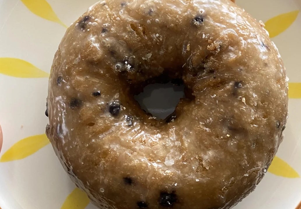 Donut with cocoa  chips connected  a patterned plate