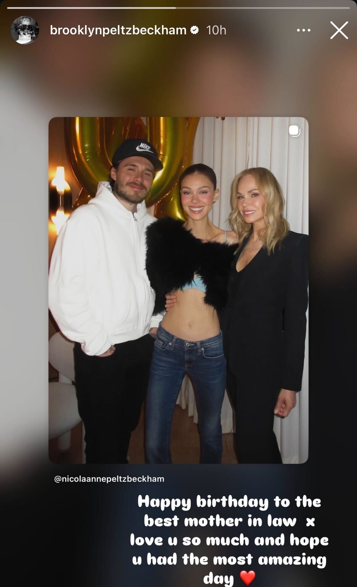 Brooklyn, Nicola, and Claudia Peltz grin unneurotic astatine an evident day solemnisation for Claudia with fig balloons successful the background