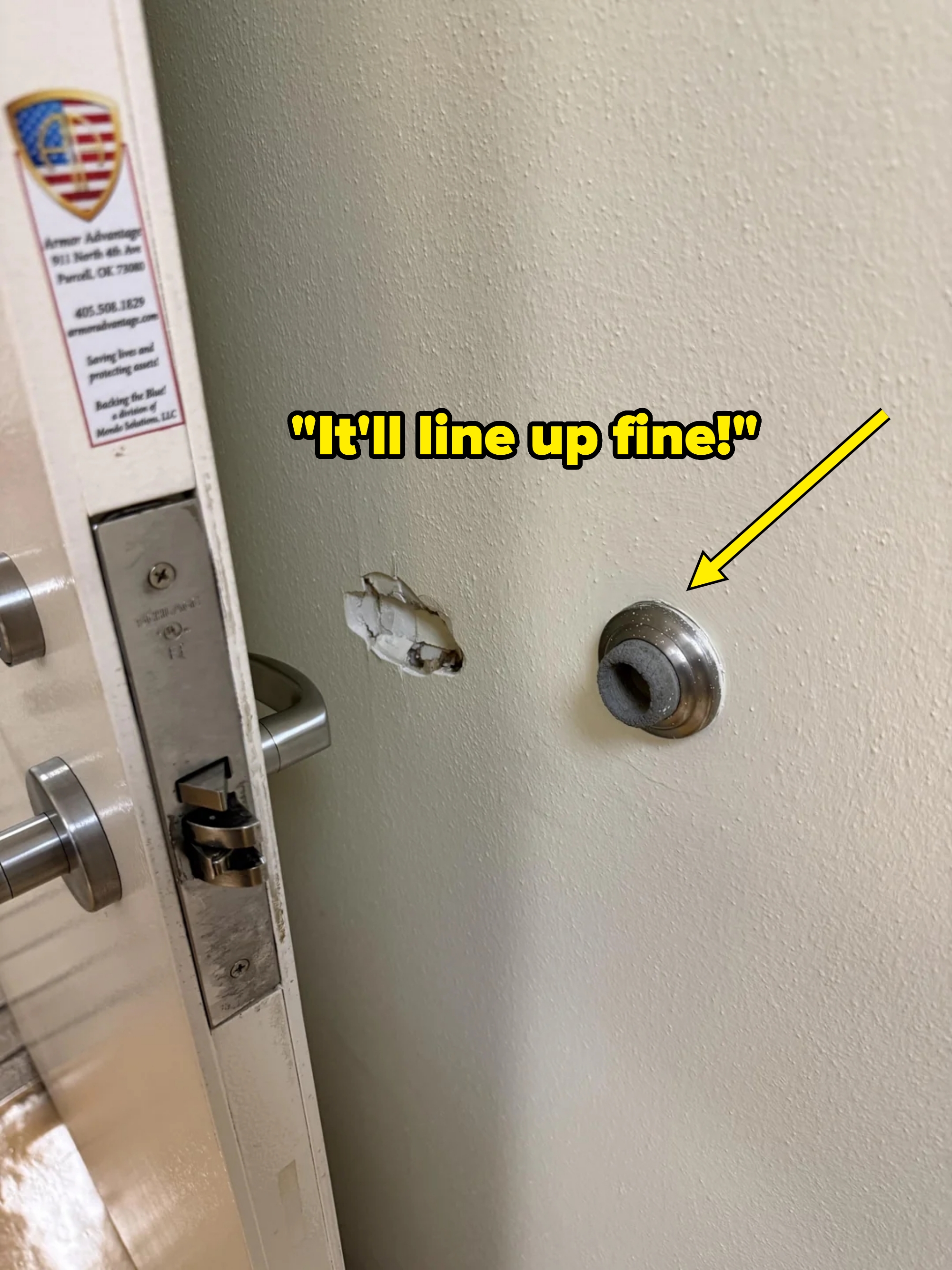 A doorway  is partially open, revealing a spread   successful  the partition  wherever  the doorknob has repeatedly deed  it