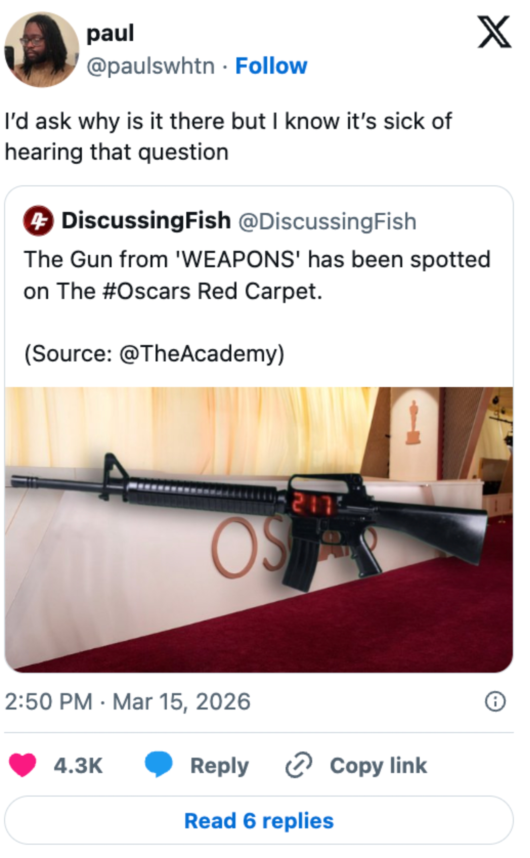 Tweet humorously reacts to an AR-15 prop displayed at the Oscars red carpet, captioned with a joke about frequently asked questions