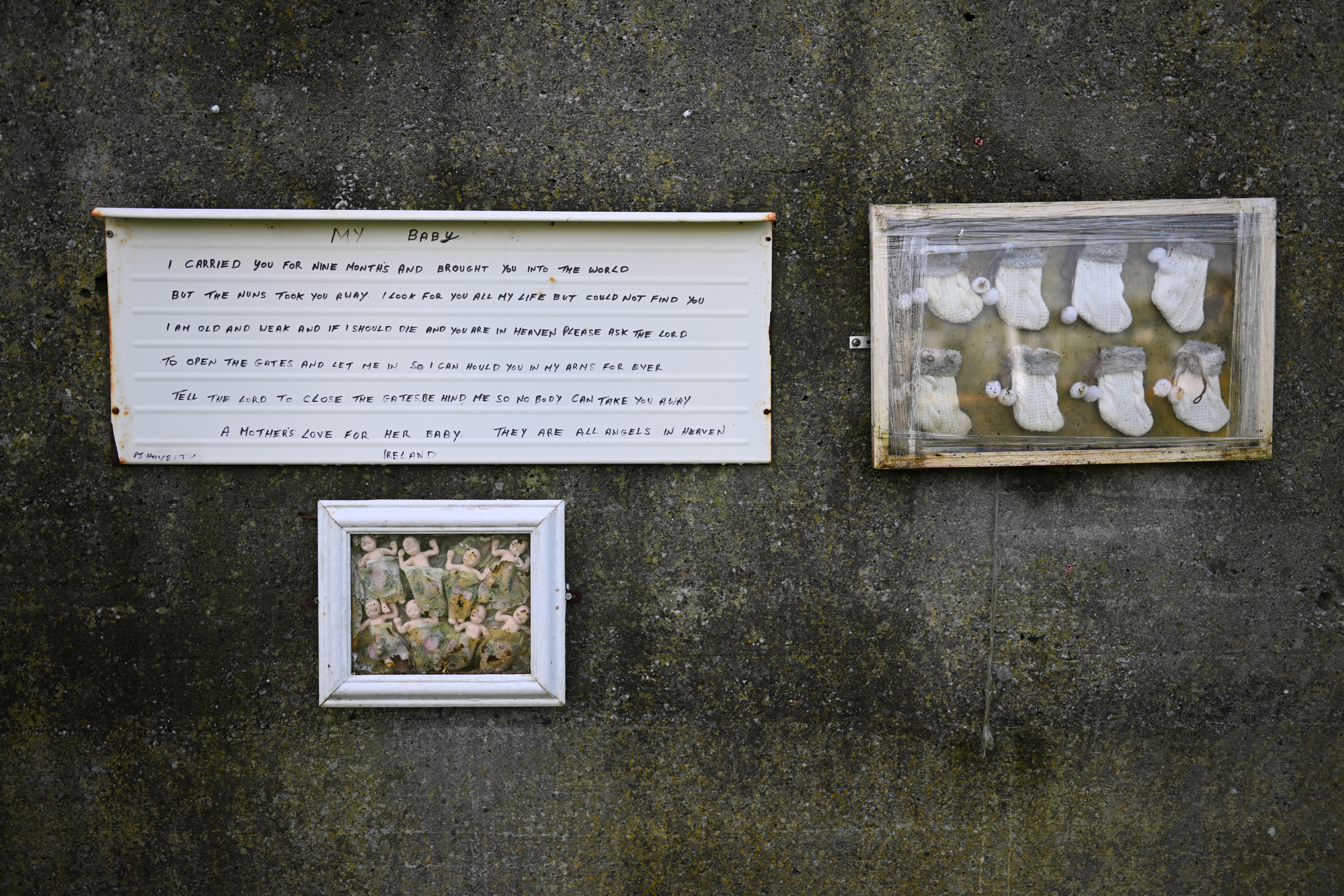 Framed insubstantial  connected  a partition  with a poem titled "Babies," and 2  framed images, 1  of teddy bears and 1  of babe  booties