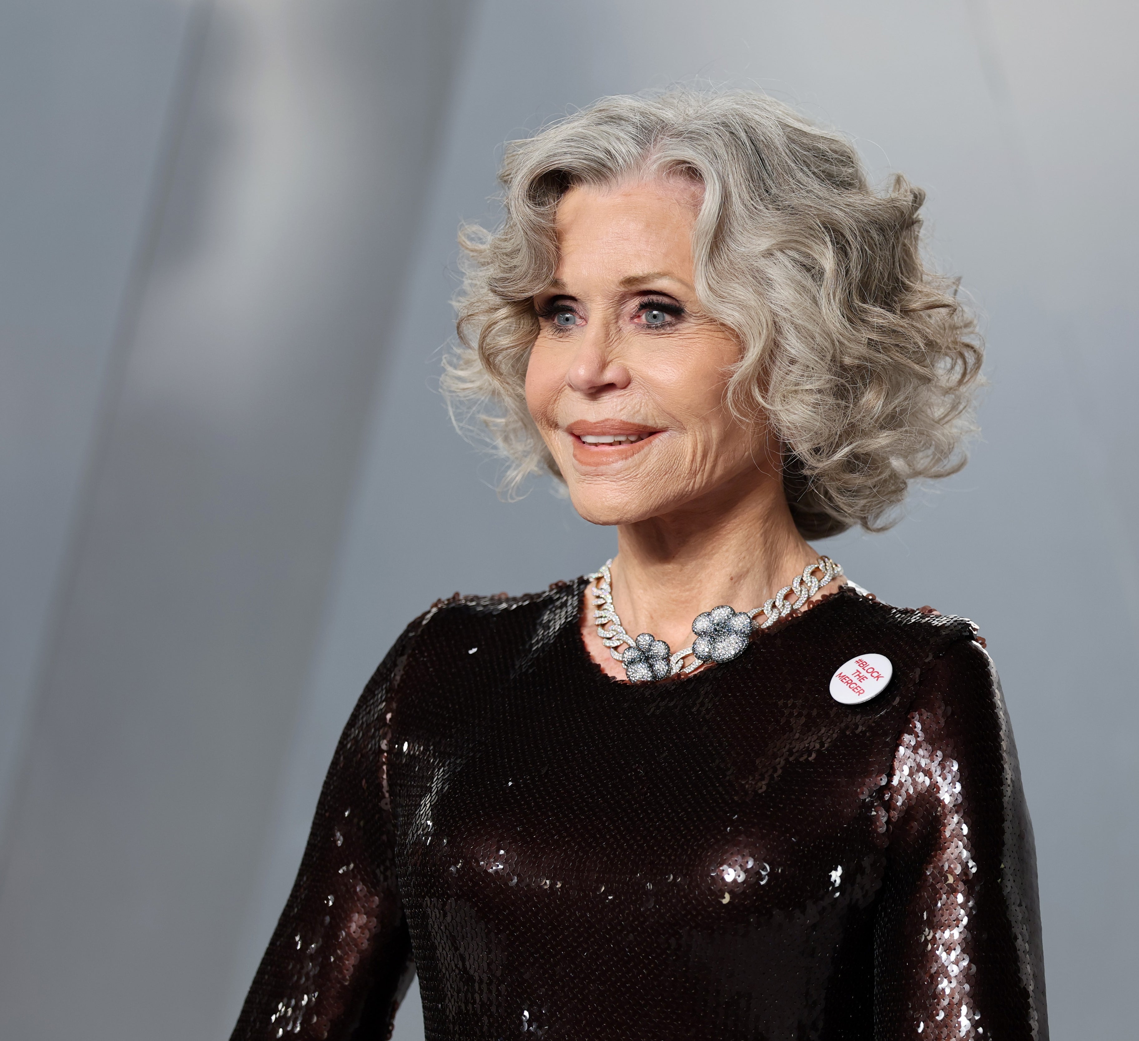 Jane smiling astatine  an event