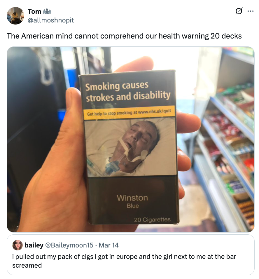 A manus  holds a cigaret  battalion  with a wellness  informing  representation  and text. A tweet beneath  mentions a absorption    to European cigaret  packaging