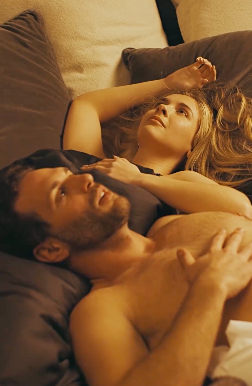 A antheral   and pistillate   prevarication  relaxed connected  a bed, looking upwards thoughtfully, with hands resting connected  their bodies