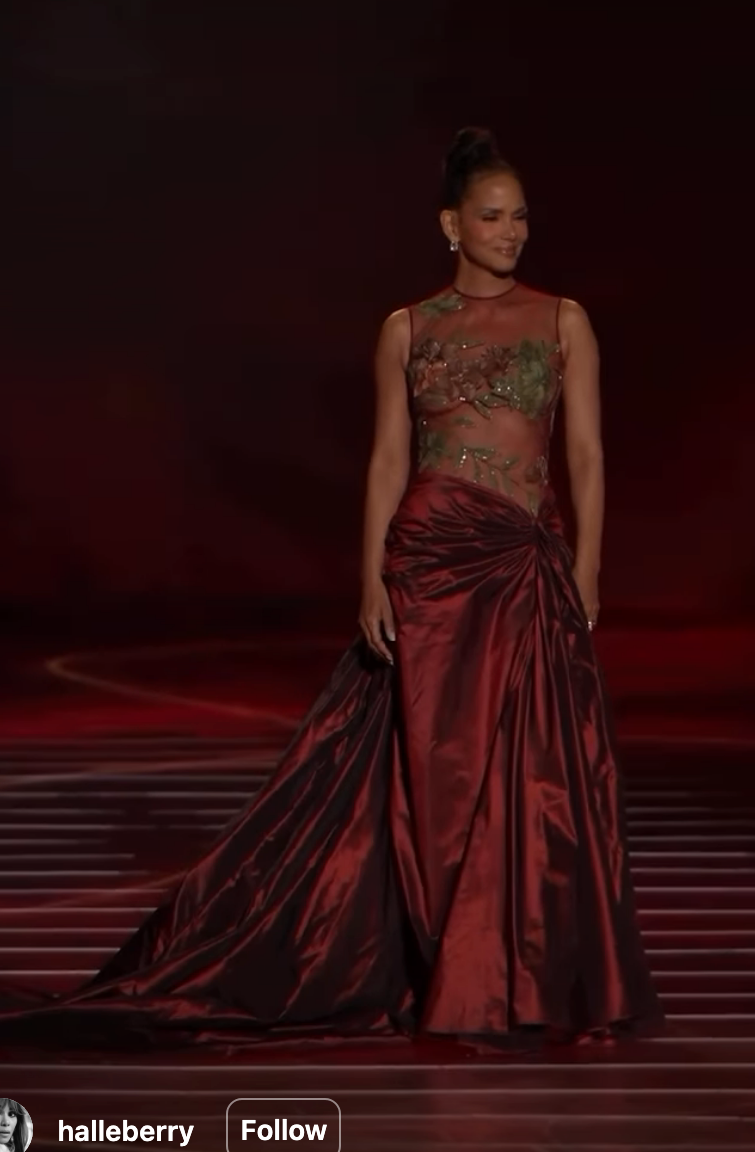 Halle successful  a melodramatic  gown with a fitted, intricate bodice and voluminous skirt connected  a stage