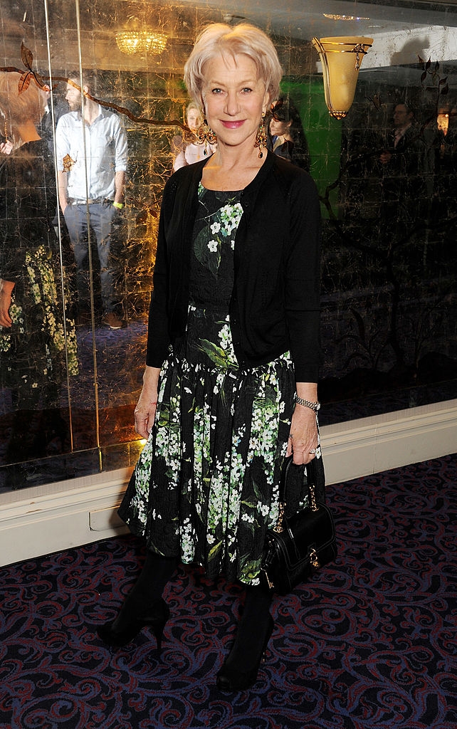 Helen wearing a floral formal  with a airy  cardigan