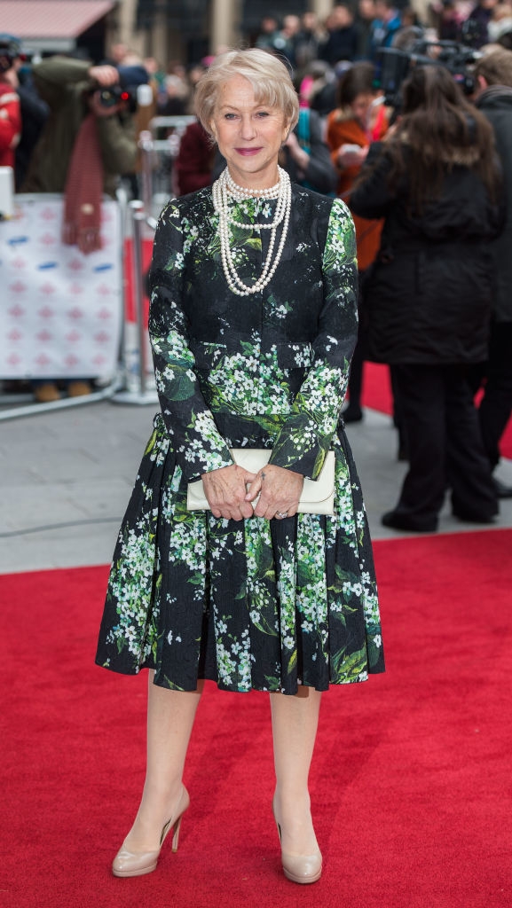 Helen wearing floral formal  with layered pearl necklaces