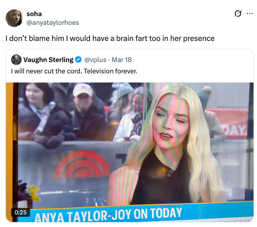 Anya Taylor-Joy connected  a speech   amusement   set, smiling and wearing a sleeveless achromatic  dress. People successful  the inheritance  ticker  down  a solid  window