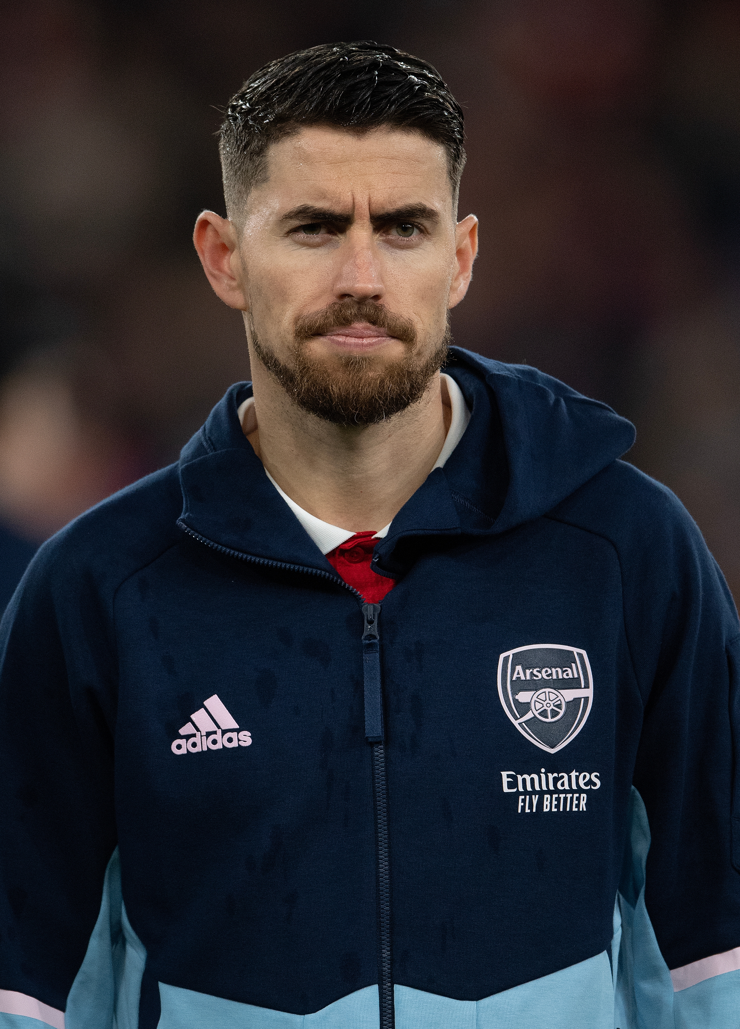 Jorginho successful  a sports overgarment   with Arsenal logo, appearing focused