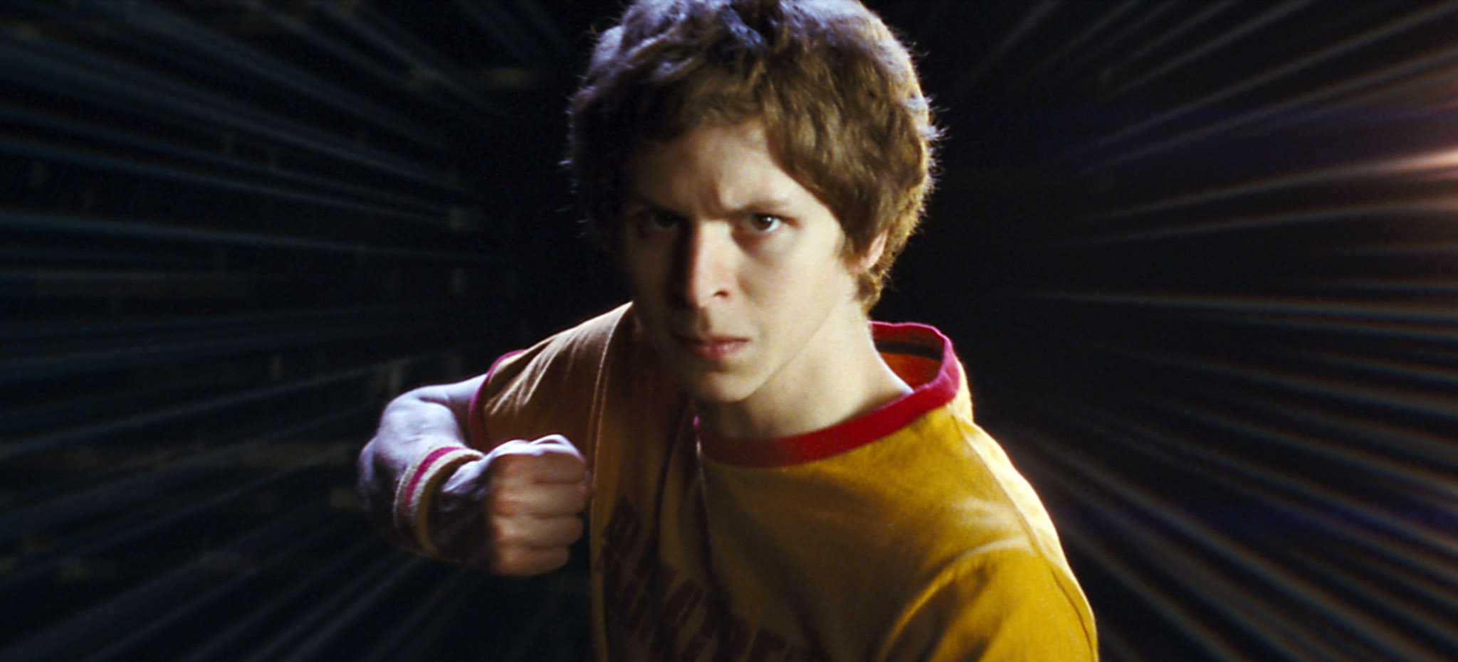 Michael successful  a vintage-style t-shirt with a determined expression, posing arsenic  if acceptable   for action, successful  "Scott Pilgrim"