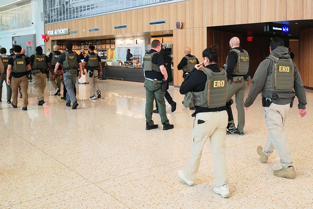 Law enforcement officers successful tactical cogwheel patrol an indoor nationalist space