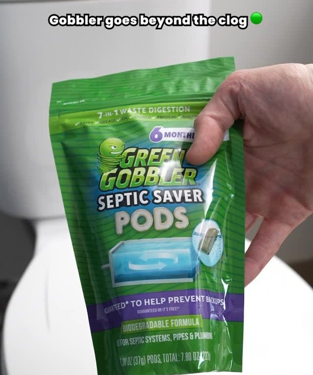 Person holding a package of Green Gobbler Septic Saver Pods in front of a toilet, text on image: "Gobbler goes beyond the clog."
