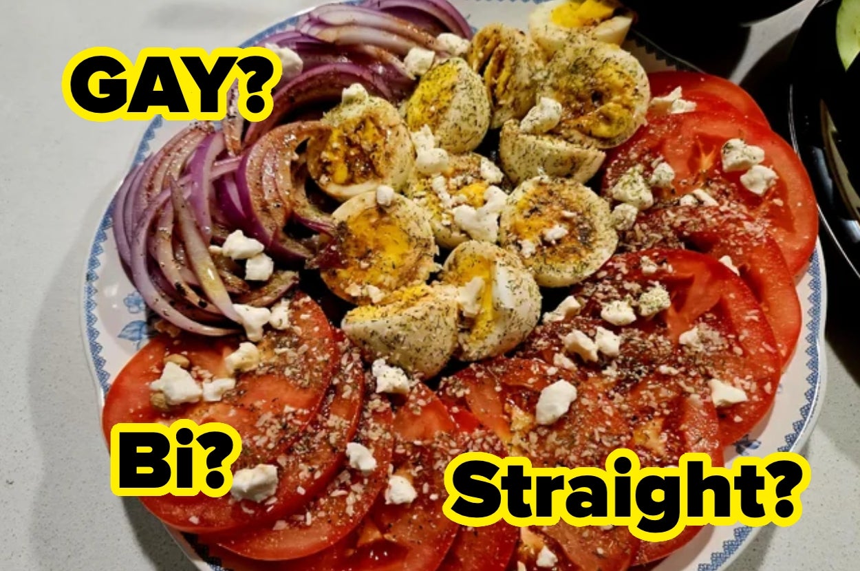 A salad with sliced tomatoes, onions, eggs, and feta cheese is overlaid with text asking, "GAY?", "Bi?", and "Straight?"