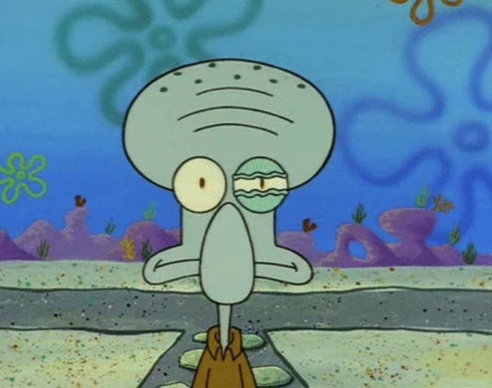 Animated quality  with a ample  chemoreceptor  and a displeased look  stands underwater with coral successful  the background