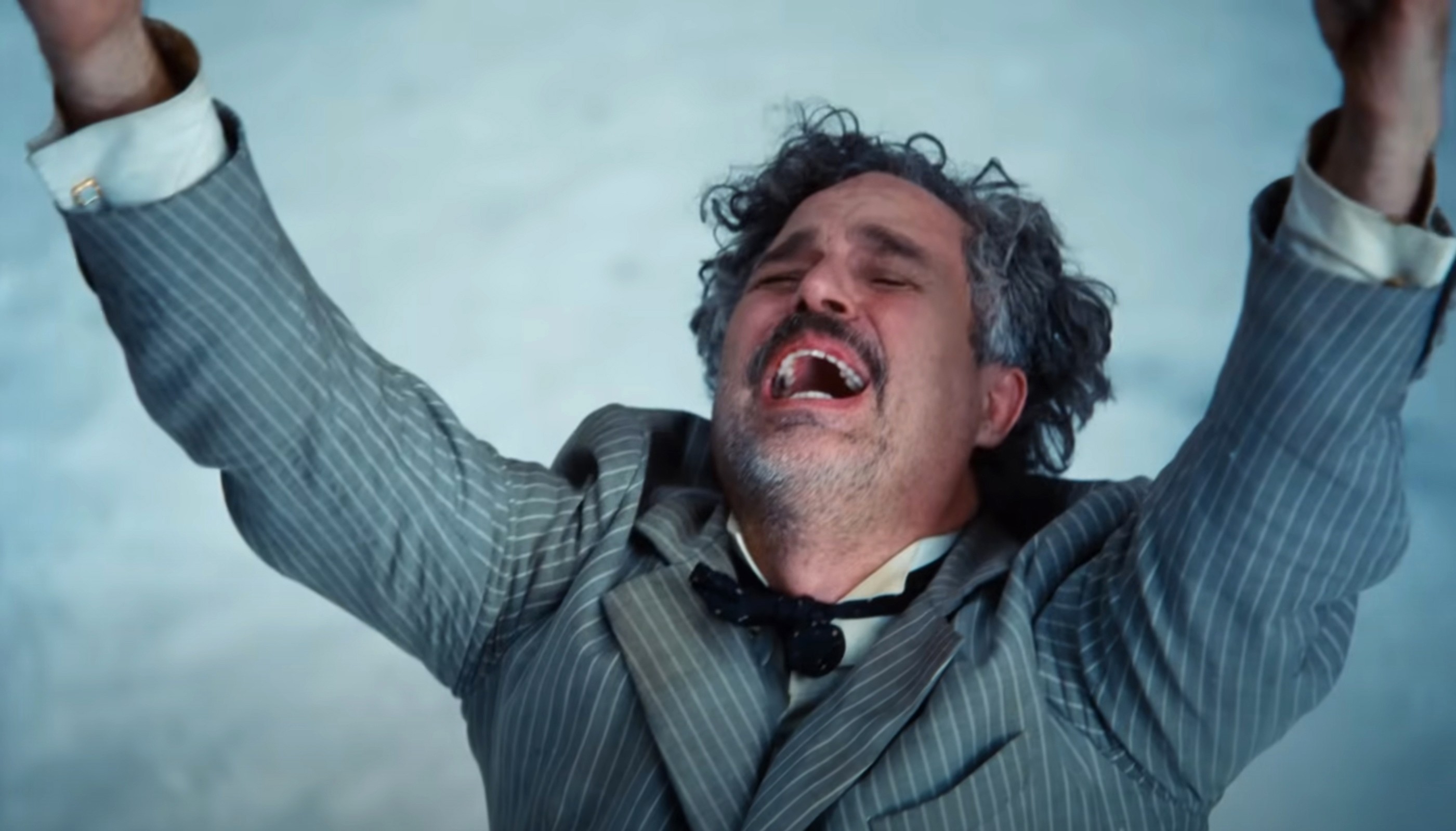 Person successful  a pinstripe suit, arms raised, appears jubilant oregon  overwhelmed, perchance  celebrating oregon  expressing relief