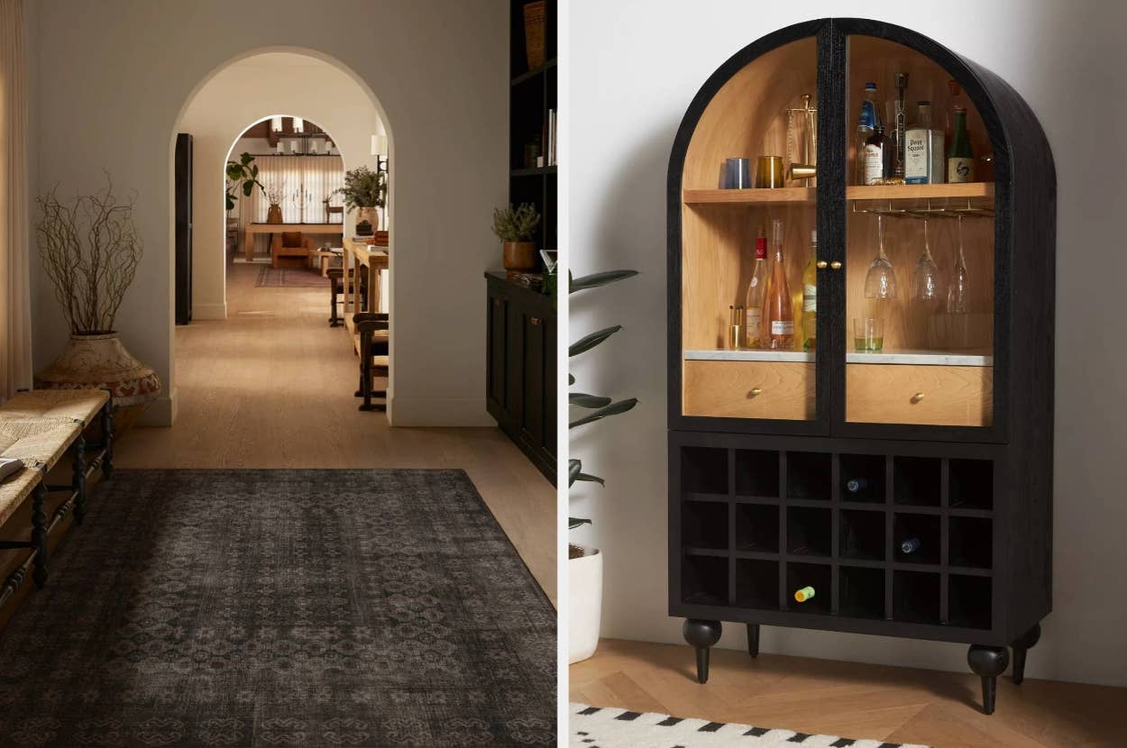 Home interior showcasing a cozy hallway with seating and an elegant black and wood bar cabinet with glassware and bottles
