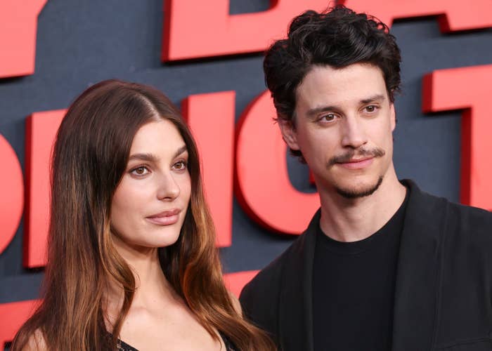 Two individuals airs  unneurotic  astatine  an event, dressed successful  elegant attire