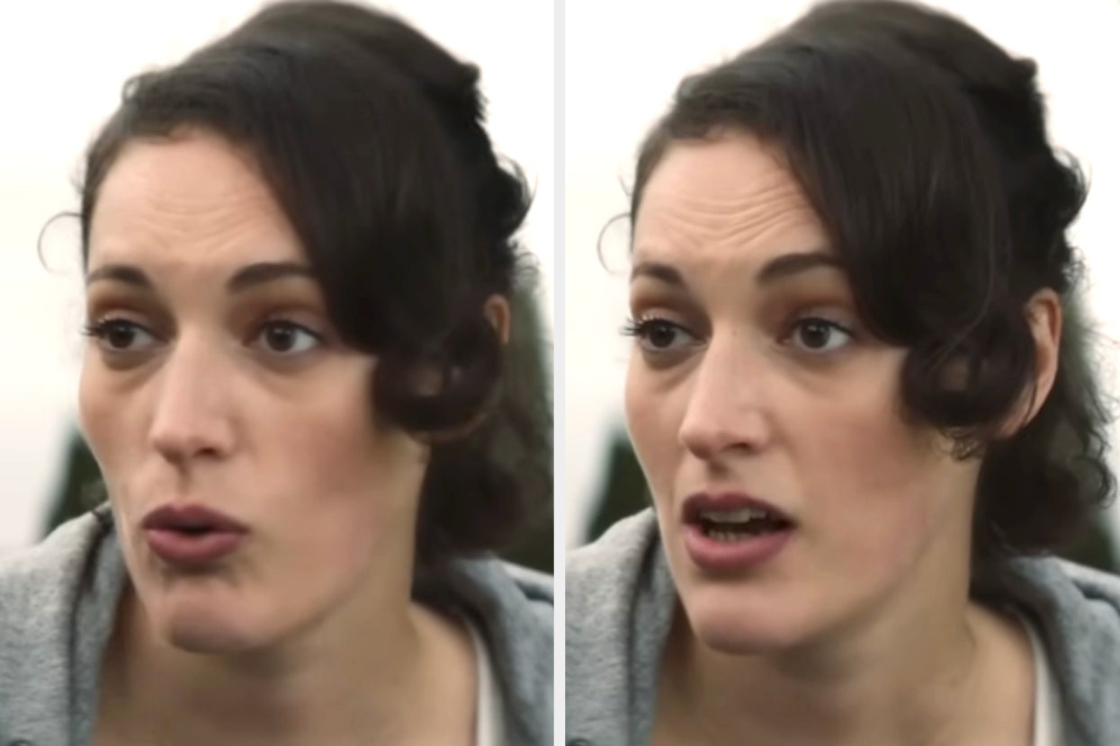 Person with curly hair in a candid expression, wearing a casual top