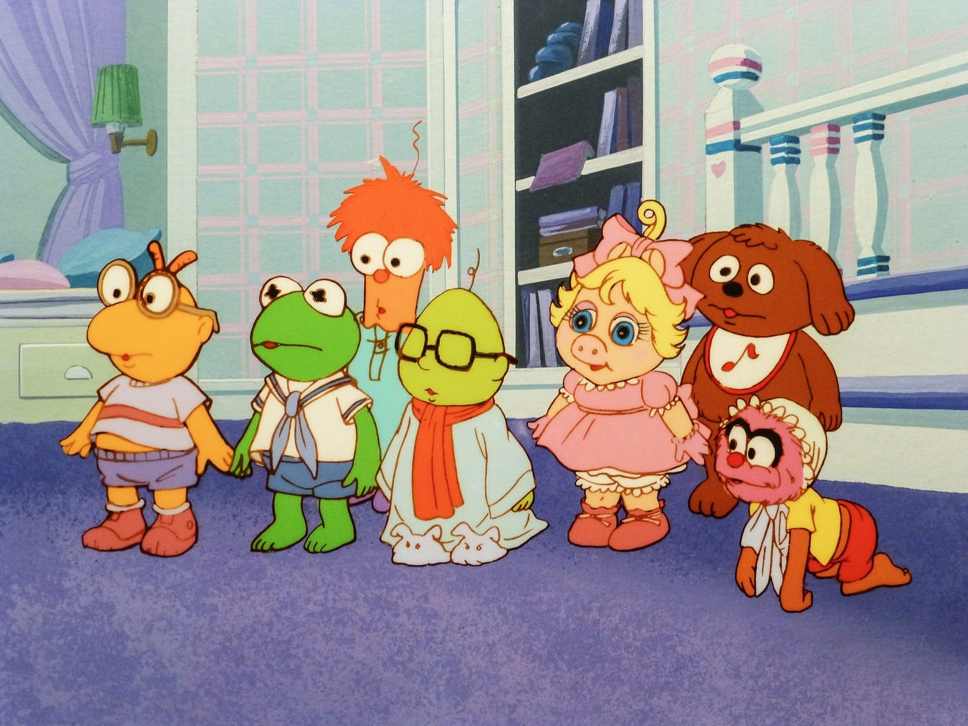Animated babe puppets sitting and lasting successful a nursery, featuring a frog, pig, dog, and others, each with unsocial outfits and expressions