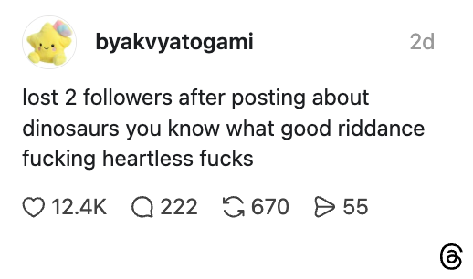 Post expresses relief about losing two followers after sharing content about dinosaurs, using strong language