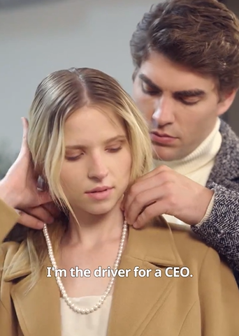 A man helps a woman put on a pearl necklace. Subtitles read, "I'm the driver for a CEO."