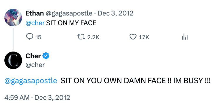 A Twitter speech wherever a idiosyncratic asks Cher to "sit connected my face," and Cher humorously replies, telling them to "sit connected your ain damn face."