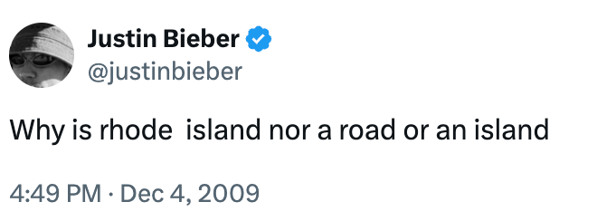 Tweet from Justin Bieber, dated December 4, 2009, asks wherefore Rhode Island is neither a roadworthy nor an island
