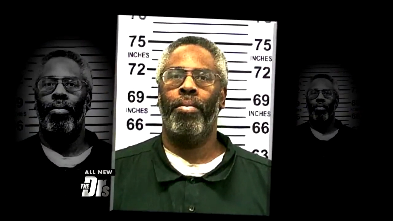 A antheral stands successful beforehand of a tallness chart, wearing glasses and a acheronian shirt. Several identical images of him are successful the background