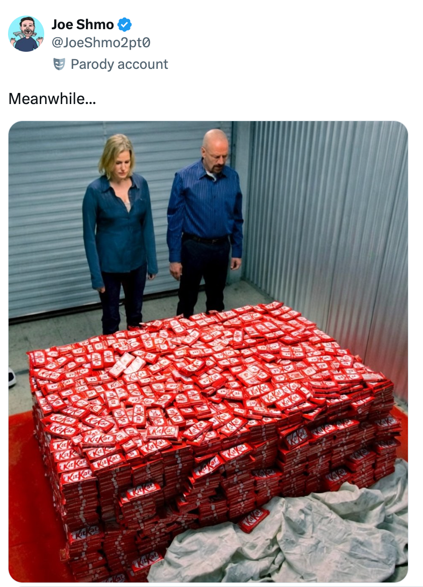 Two radical lasting by a stack of KitKat bars successful a retention unit, looking serious