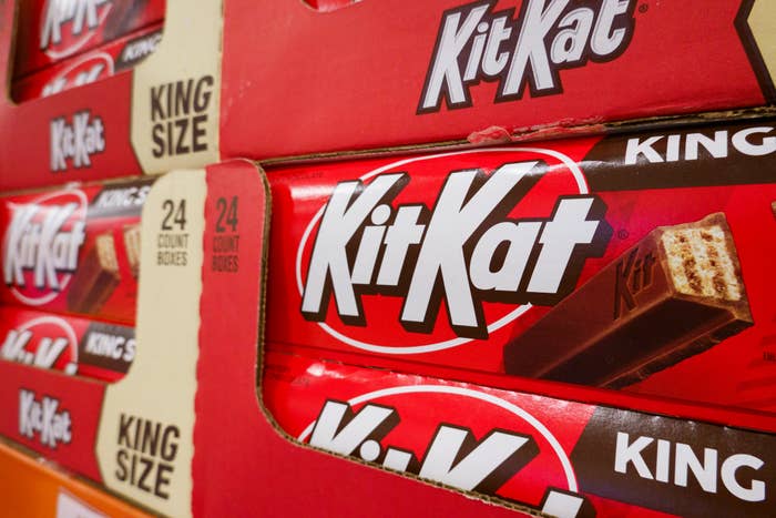 Stack of Kit Kat king-size cocoa  bars successful  a store   display