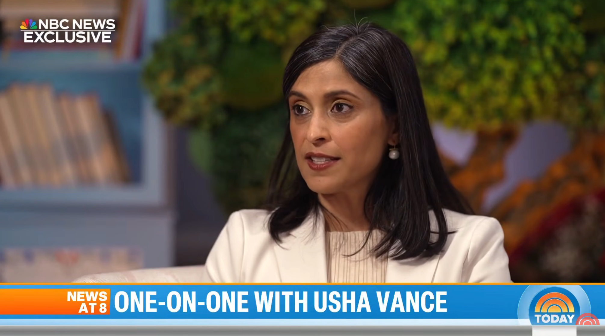 A pistillate successful a achromatic blazer speaks during a one-on-one interrogation connected NBC News