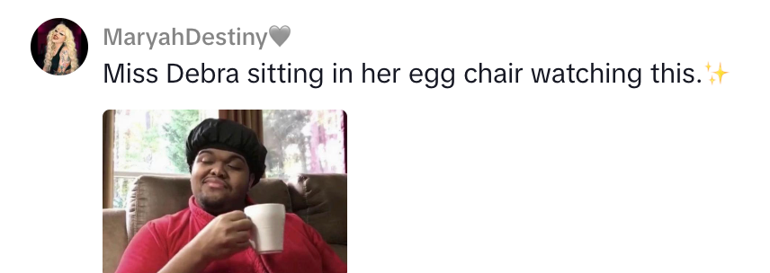 Person lounging successful  an ovum  chair, holding a mug, with a caption supra  mentioning "Miss Debra" and "watching this."