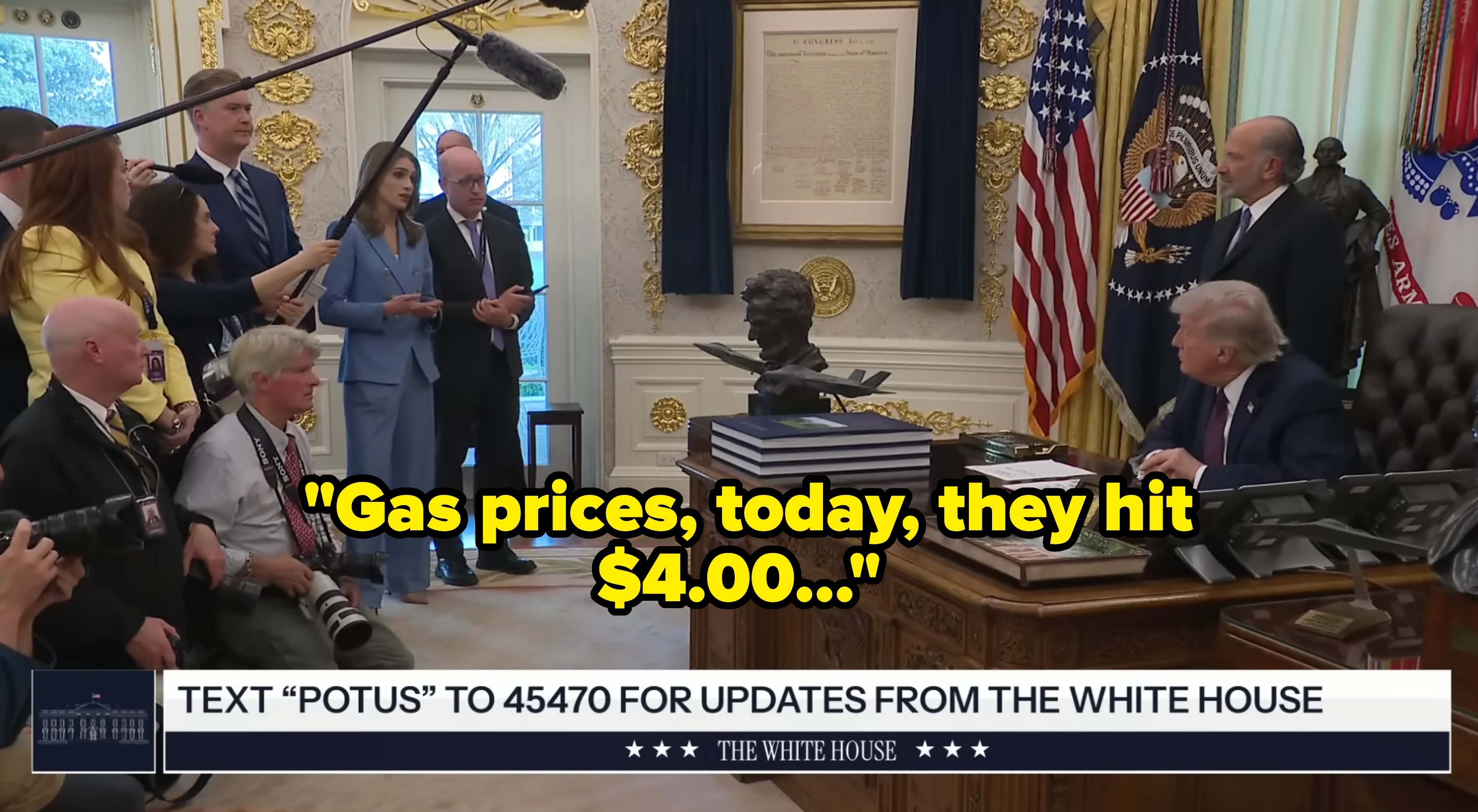 A radical  of radical   situation   a seated antheral   successful  an bureau   with cameras. A microphone is held above. Text astatine  bottommost  offers updates from the White House