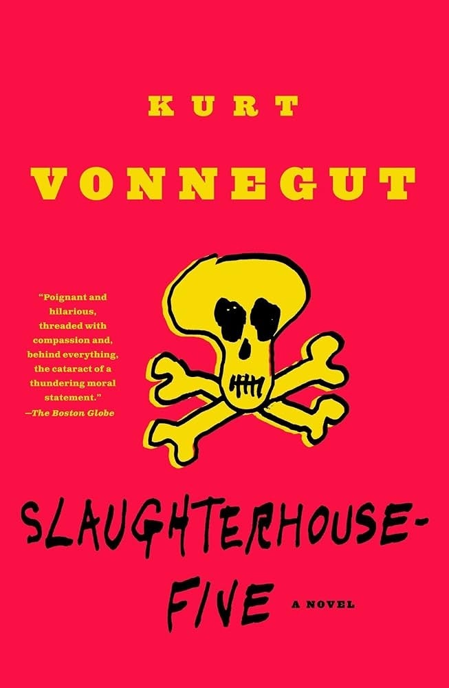 Cover of "Slaughterhouse-Five" by Kurt Vonnegut featuring a skull and crossbones illustration and a Boston Globe quote praising the novel