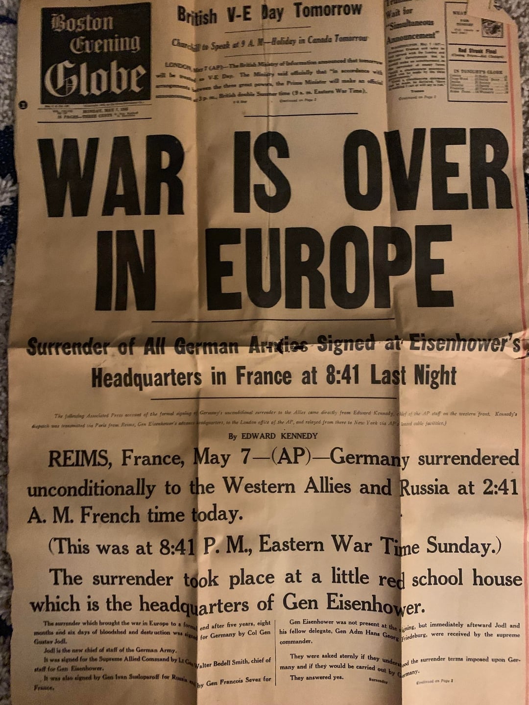 Front leafage   of the Boston Evening Globe announcing, "War is Over successful  Europe" with details of Germany's surrender successful  May 1945