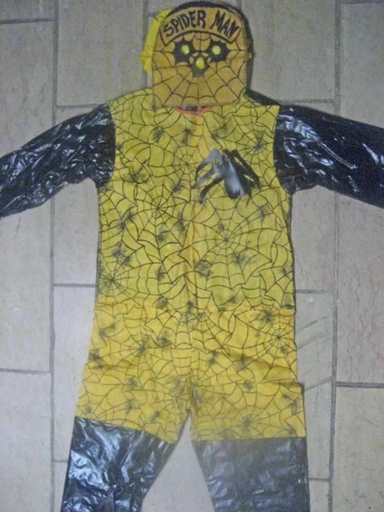 Yellow Spider-Man costume with achromatic  web patterns and gloves