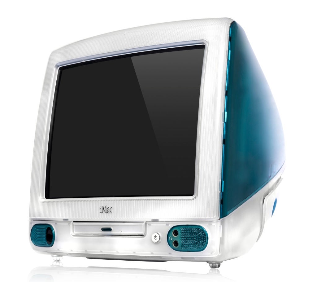 Retro-style Apple iMac with a distinctive curved plan and translucent back, reflecting precocious 1990s tech aesthetics
