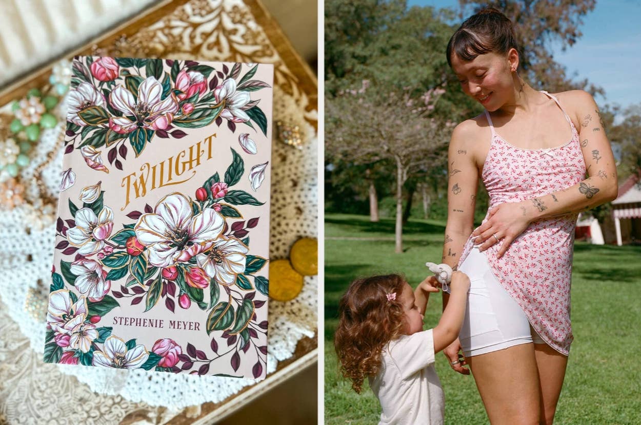 Novel "Twilight" with floral cover next to a woman in a floral dress and a child, outdoors