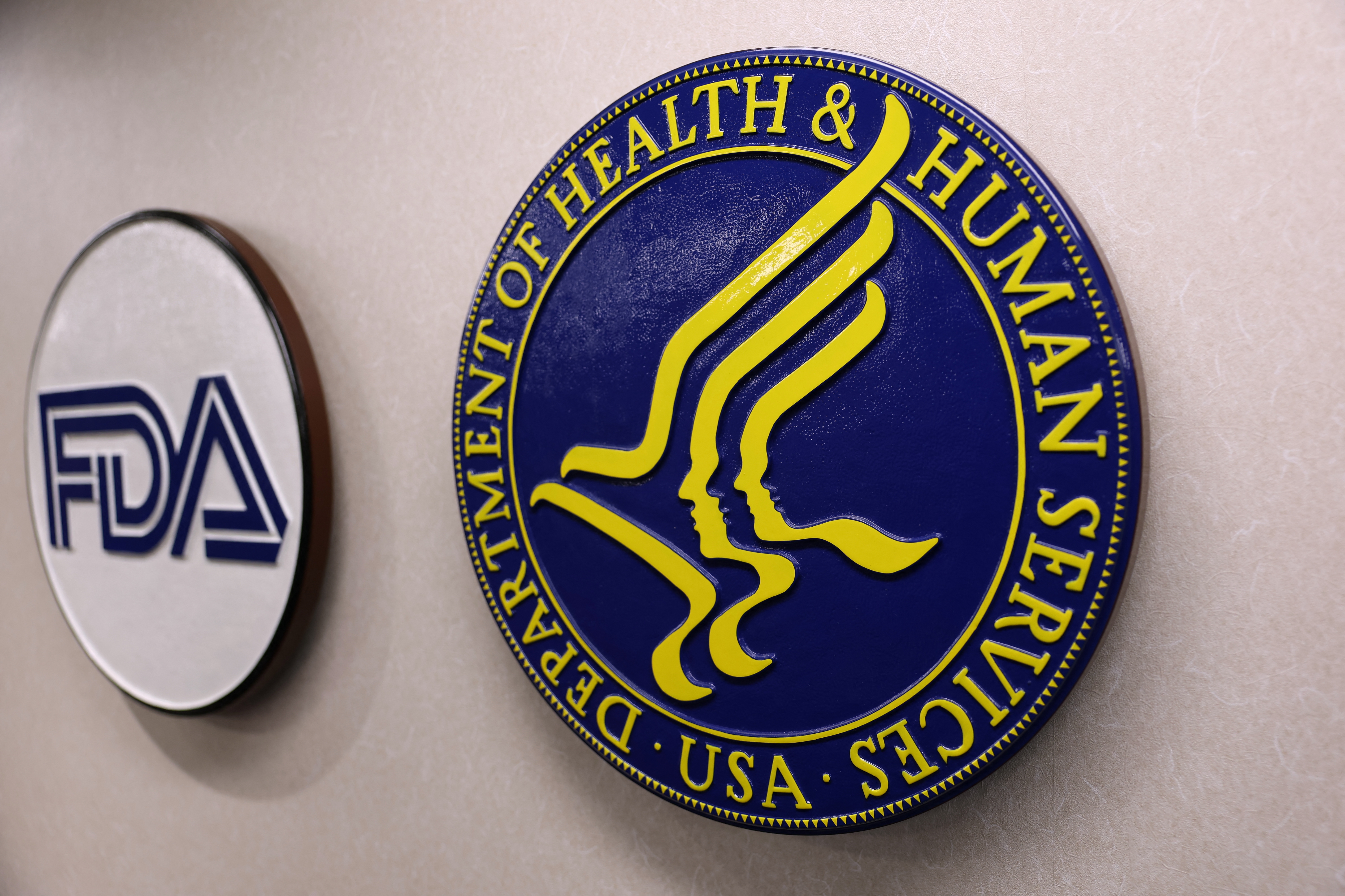 FDA and Department of Health & Human Services logos connected a wall