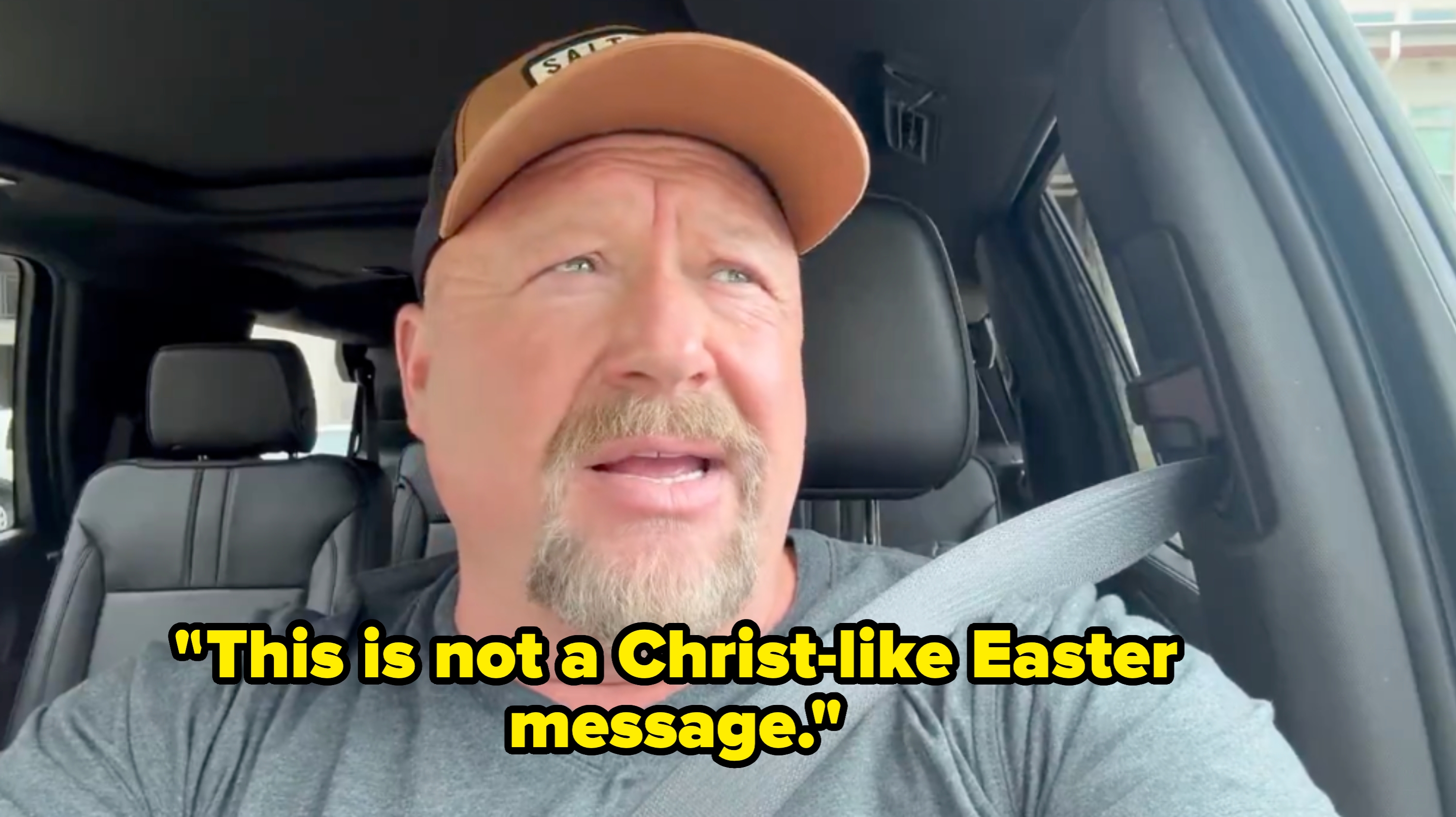 Man with a beard and a headdress  speaking portion    seated successful  a car