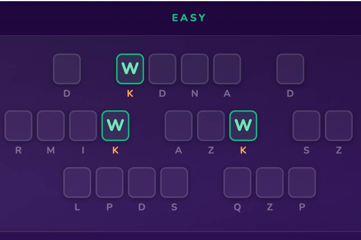 Word puzzle with letters placed in a grid. Some words include "DNA" and "WIZARD." The puzzle is categorized as easy